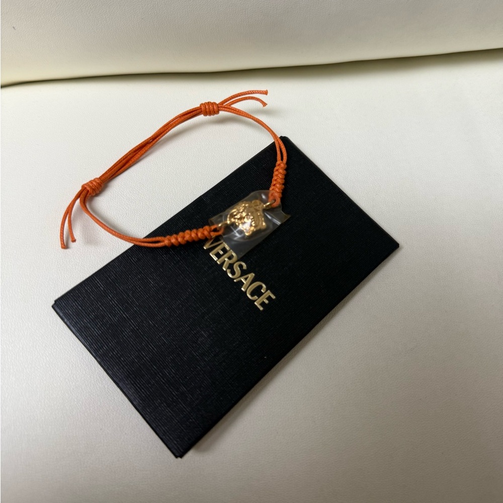 ❌SOLD❌Versace Orange Bracelet with Gold Medusa Bracelet